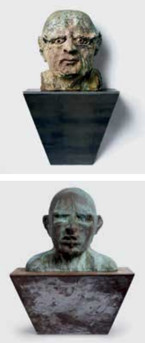 Two bust sculptures on black platforms, one above the other, with distinct facial expressions and textures.